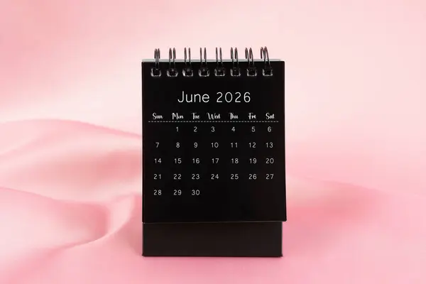 Black Desk Calendar June 2026 Pink Color Silk Textile Background — Stock Photo, Image