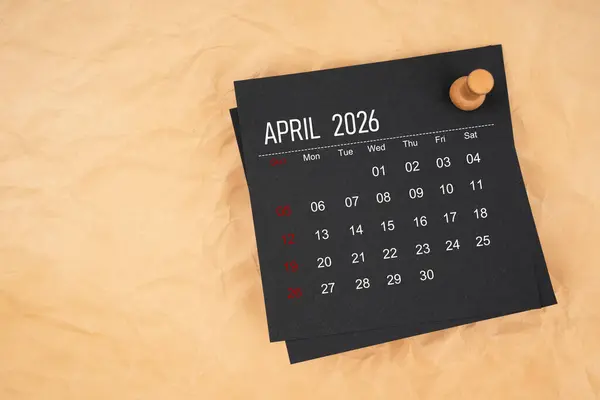Black Calendar April 2026 Thumbtack Brown Paper Crumpled — Stock Photo, Image