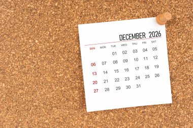 Aralık 2026 için tahta raptiyeli beyaz takvim sayfası, kopya alanı olan konum.