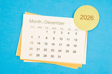 Aralık 2026 takvim sayfası mavi arkaplan.