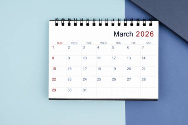 March 2026 monthly desk calendar for 2025 year on blue color background.	