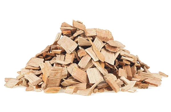 Pile of wood chips from alder tree. Wooden chips for smoking meat and fish isolated on a white background.