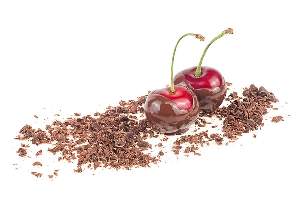 Two red chocolate cherries with grated chocolate isolated on a white background