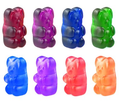 Sweet candy food - set of colorful beautiful jelly bears on a white background. Menthol, lemon, blueberry, orange and strawberry flavors. clipart