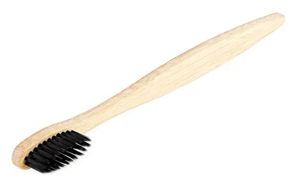白い背景に黒いブラシ毛が隔離された竹の木の歯ブラシ 天然竹歯ブラシ — ストック写真