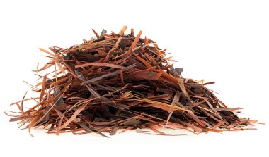 Pile of natural Taheeboo dry tea isolated on a white background. Lapacho herbal tea. Tabebuia heptophylla. clipart