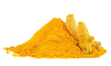 Pile of curcuma powder and dried turmeric roots isolated on a white background