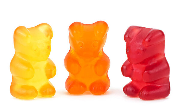 Set of red, yellow and orange jelly gummy bear isolated on a white background. Colorful jelly gummy bears.