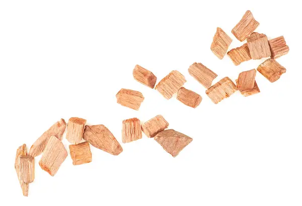 stock image Chips for smoking meat and fish isolated on a white background, top view. Mixed wooden chips.