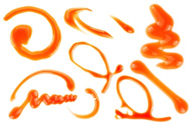 Beyaz arka planda izole edilmiş farklı karamel lekeleri koleksiyonu. Altın sıvı karamel.