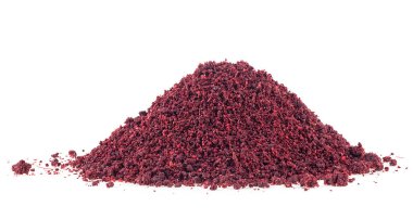 Dried ground sumac spice pile isolated on a white background. Sumac powder. clipart