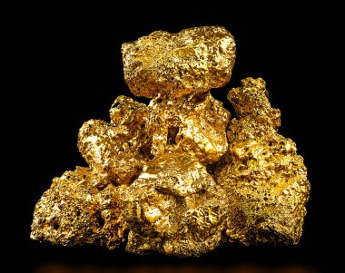 Siyah arka planda izole edilmiş altın külçeleri. Madendeki altın cevheri. Hazine.