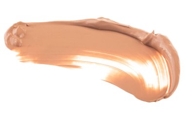 Beyaz arka planda izole edilmiş bej renkler ve makyaj temeli dokusu veya akrilik boya. Kapatıcıymış. Makyaj temeli kremsi dokusu.