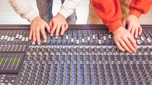 Four Sound Engineer Hands Working Audio Mixing Console Recording Broadcasting — Stock Photo, Image