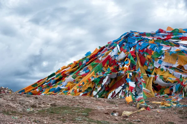 Colorful prayer flags on strings - flying in the wind on Nam Tso Lake, Damxung County, Lhasa, Tibet, China.