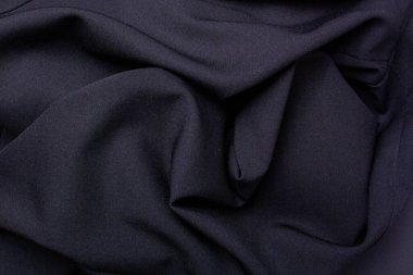 Kumaş arkaplan üst görünümü siyah katları. Satış konsepti