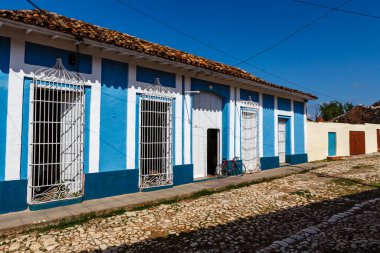 Old blue colonial houses in the center of Trinidad, Cuba, Caribbean