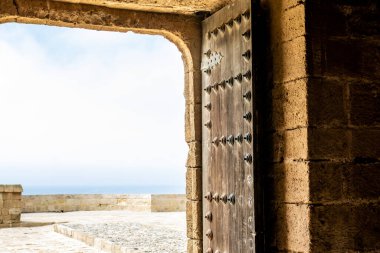 Iron doors inside of the Alcazaba of Almeria, in Andalusia, southern Spain, Europe