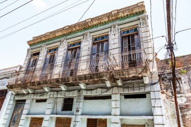 Old ruined colonial building in the historic center of Santiago de Cuba, Cuba, Caribbean