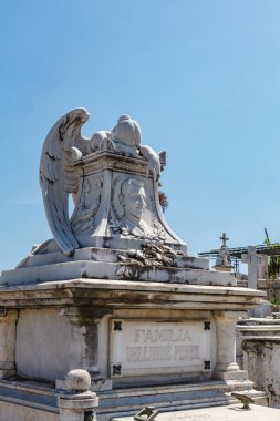Rich decorated grave with a mourning angel statue at the Santa Ifigenia Cemetery in Santiago de Cuba, Cuba, Caribbean