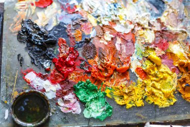 Painter's palette with colorful oil paint in a studio in Cienfuegos, Cuba, Caribbean