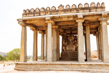Big Ganesha statue inside of a temple, Hampi, Karnataka, India clipart