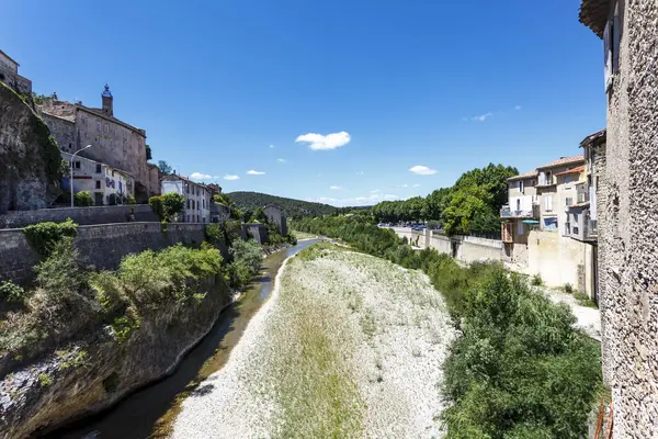 stock image View at the L'Ouveze river from the Roman bridge in Vaison-la-Romaine, Provence, France, Europe