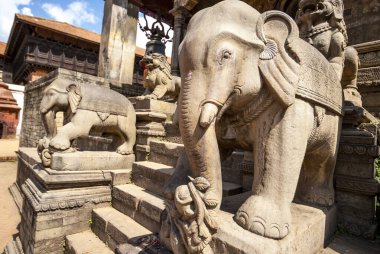 Big elephant sculptures at the entrance of a temple in Bhaktapur, Nepal, Asia