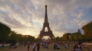 Eiffel Tower with artesian well, water gush in summer holiday, Paris city in sunny day. High quality 4k footage