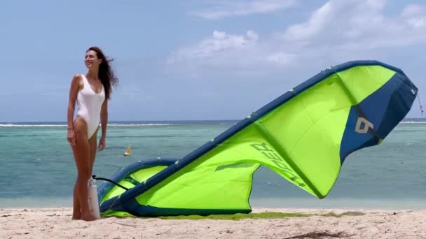 Girl Athletic Build White Swimsuit Stands Beach Green Kite Beautiful — Stock Video