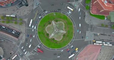 Aerial view of a city in Spain. Roundabout city traffic, top view. High quality 4k footage