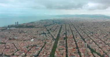 Aerial view of typical buildings of Barcelona cityscape. Eixample residential famous urban grid. Catalonia, Spain. High quality 4k footage