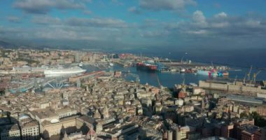 Aerial panoramic drone view of buildings and streets surrounding Port. Cruise ships and ferries port. Old famous city with roofs of old buildings, historical streets. High quality 4k footage