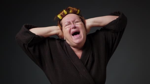 Elderly Woman Suffers Headaches Migraine Attacks Evil Expression Black Background — Αρχείο Βίντεο