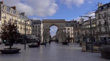 Dijon, France - February 06, 2023: Walk through the historic center of Dijon, the capital of Burgundy. Ancient knowledge and hotels of the Middle Ages have been preserved to this day. French culture.
