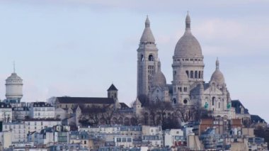 Wide view of the architecture of the streets of Paris, the architecture of the buildings of France Basilica in Montmartre. High quality 4k footage