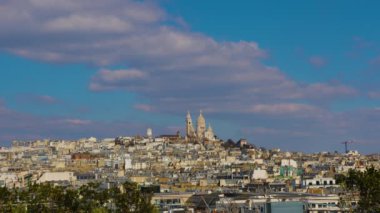 Establishing view of Paris Sacre-Coeur Basilica Church and butte Montmartre hill on a beautiful day, Paris France attractions. High quality 4k footage