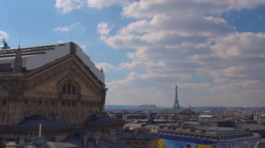 Timelapse of classic roof top view in the center of Paris. View from the observation deck of the gallery from the height, in a sunny day. High quality 4k footage