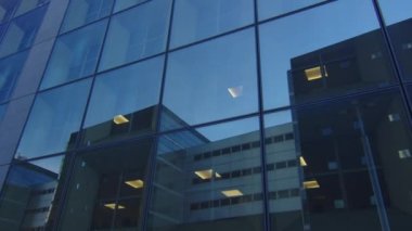 Modern office high rise skyscraper buildings. City business district. Looking up at business buildings. Low angle view of business buildings. Paris France. High quality 4k footage