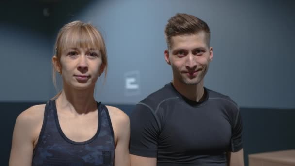 Young Couple Trains Gym Doing Modern Exercises Improve Figure Take — Stock Video