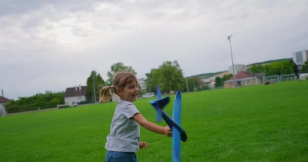 Little Girl Runs Toy Plane Her Hand Kid Child Run — Stock Video