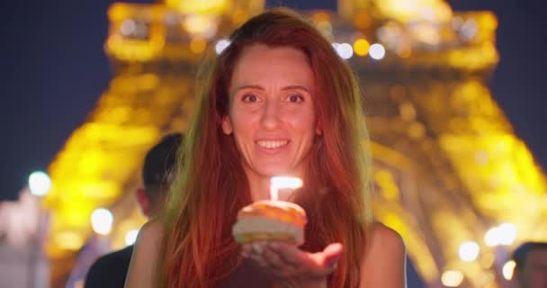 Close Attractive Cheerful Woman Curly Hair Blowing Candles Eiffel Tower — Stock Video