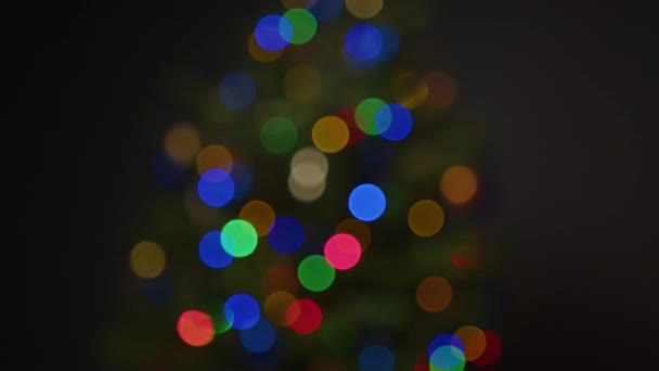Blurred Blinking Christmas Lights Flares Out Focus — Stock Video