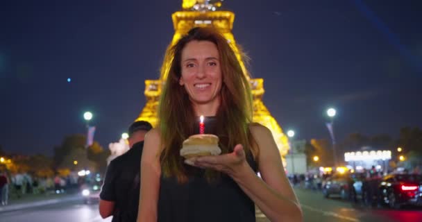 Close Attractive Cheerful Woman Curly Hair Blowing Candles Eiffel Tower — Stock Video