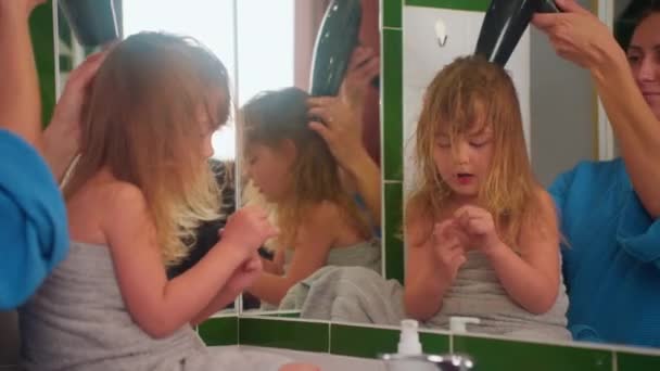 Cute Little Girl Dries Her Hair Hairdryer Shower — Stock Video