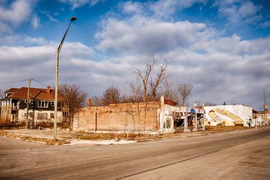 Highland Park 'taki Hamilton Caddesi' ndeki boş bir köşe başı parkı bir zamanlar terk edilmiş ve şimdi yerle bir olmuş küçük bir dükkandı..