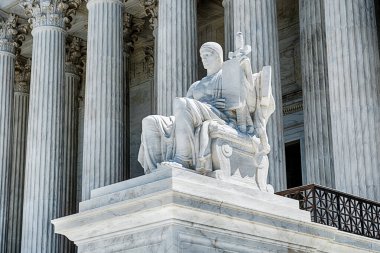 The Authority Of The Law is the white marble statue at one end of the entrance to the Supreme Court of the United States. clipart