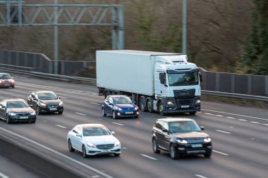 Chorleywood, UK - February 25, 2023: Afternoon traffic on british motorway M25