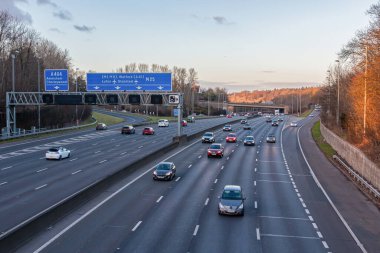 Chorleywood, UK - February 25, 2023: British road transport. Evening traffic on busiest British motorway M25
