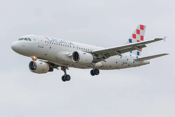 stock image London, UK - March 4, 2023: Airbus A319 Croatia airlines approaching to London Heathrow airport.